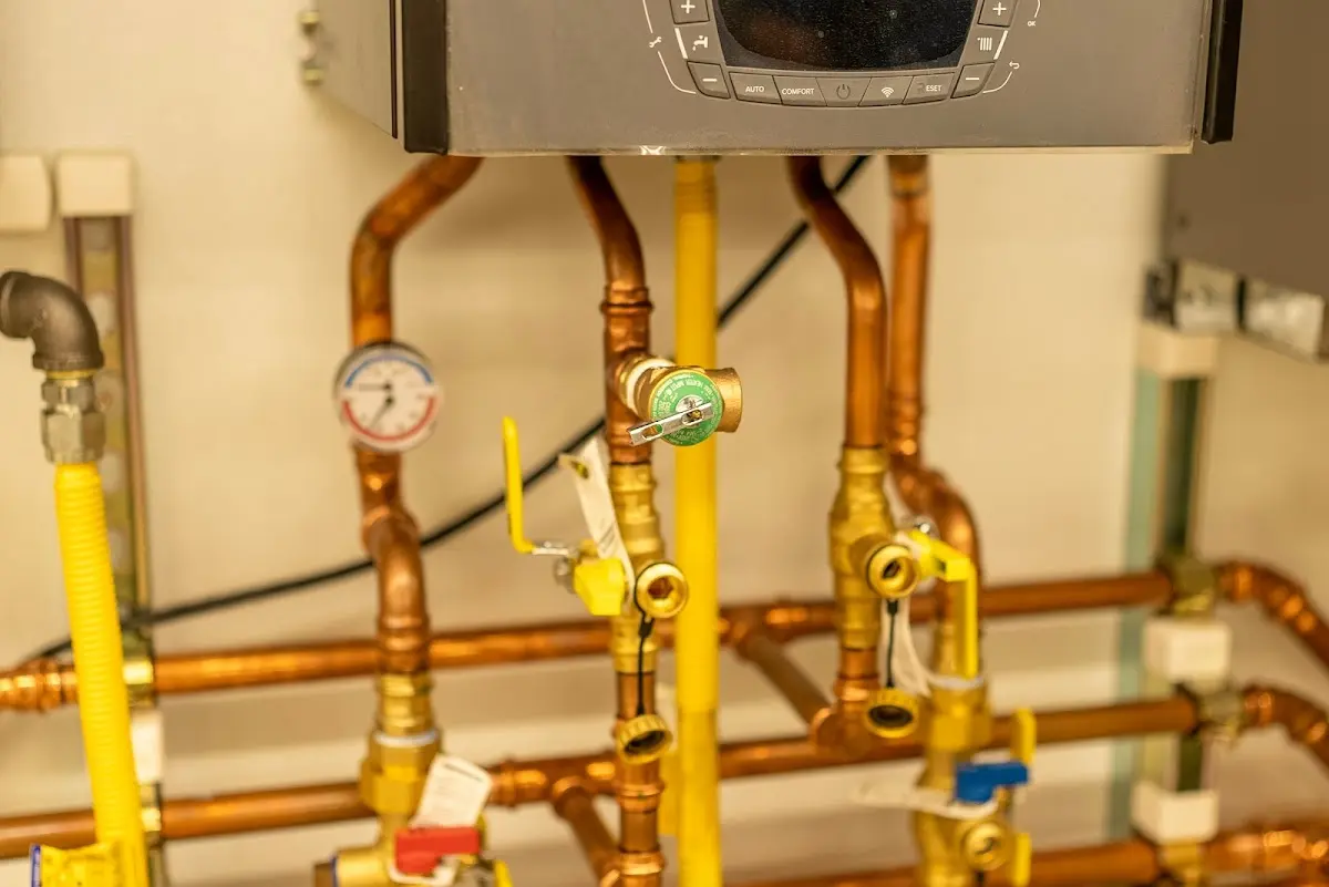 Licensed technician providing Sump Pump Repair for a homeowner in Norton